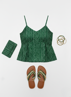 Green printed peplum tunic top.