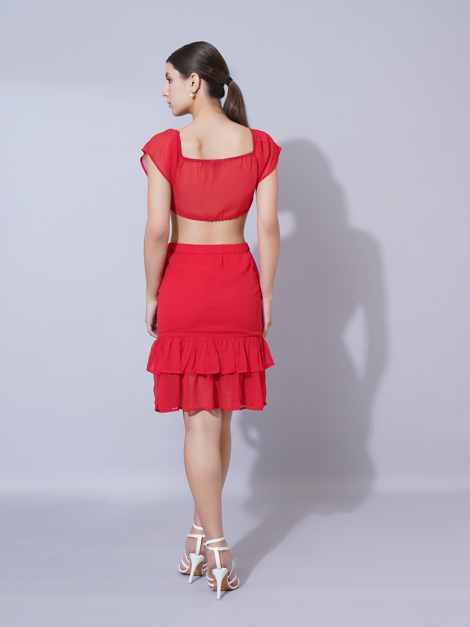 Red tie up top with mini skirt